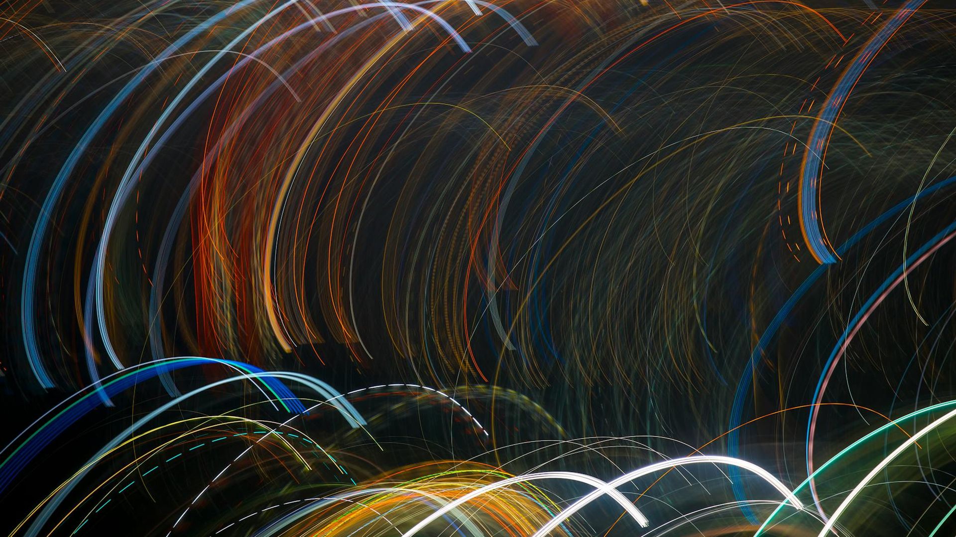 Abstract image showing fluid lines of light representing movement and rhythm.